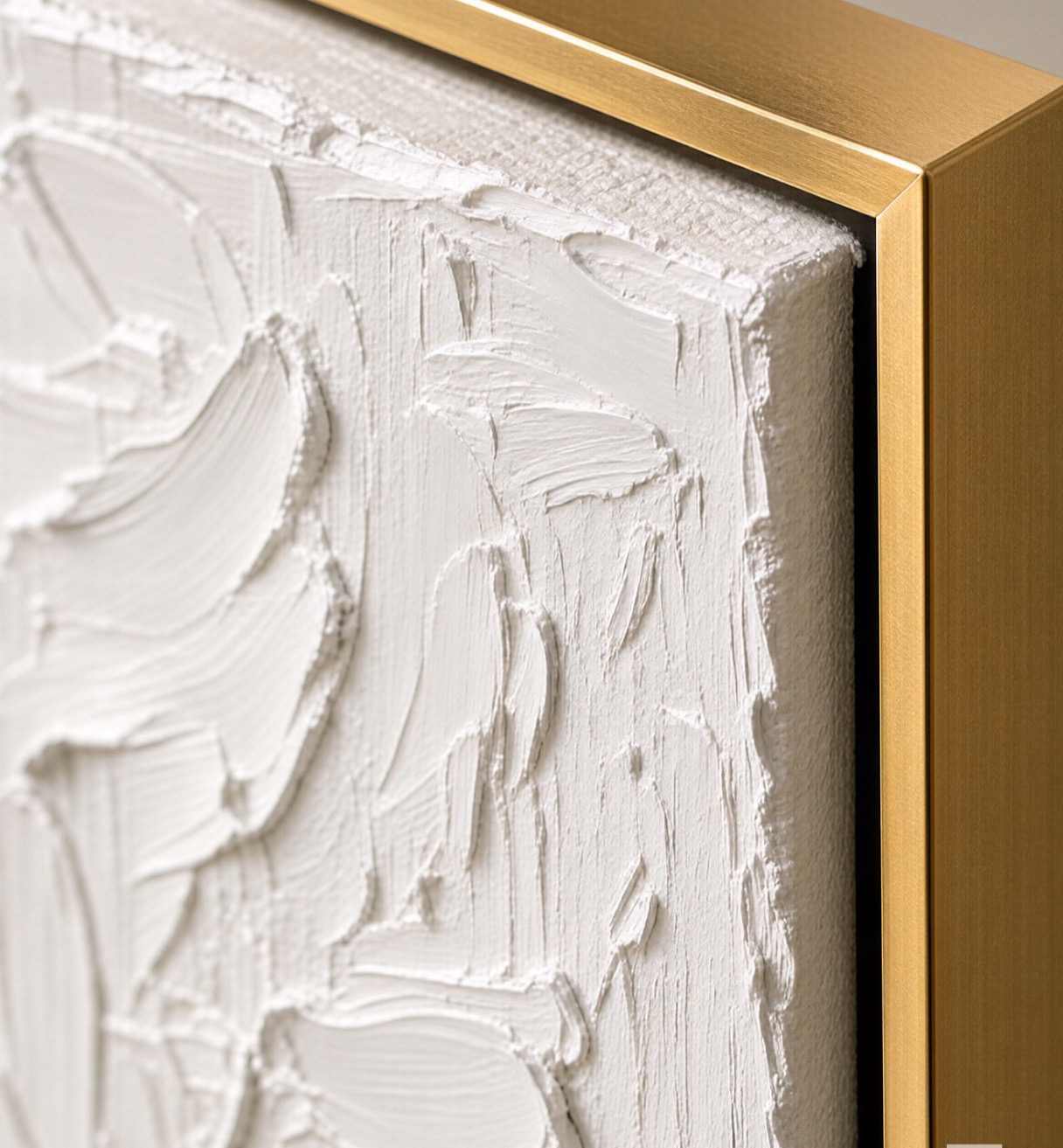 Gold frame corner detail on a textured canvas painting
