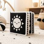 Organic Cotton Visual Card Cloth Book in use — baby playing with cloth book