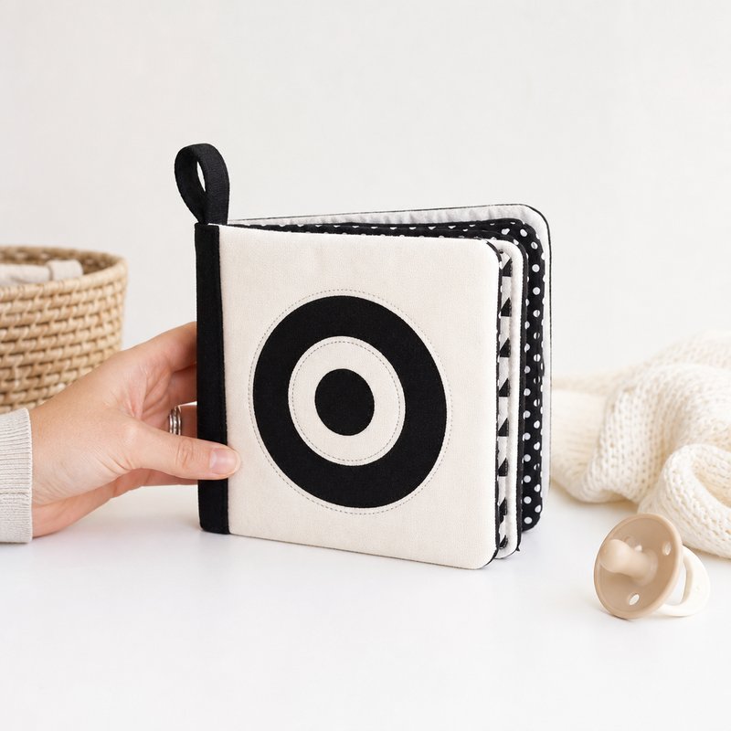 Organic Cotton Visual Card Cloth Book size comparison with baby hands