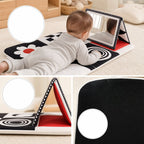 Tummy Time Mirror Mat Book close-up — key improvement details