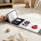Tummy Time Mirror Mat Book size comparison with baby hands