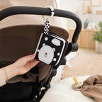 Stroller & Car Seat Clip-On Cloth Book size comparison with baby hands