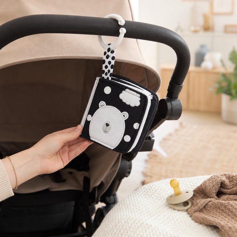 Stroller & Car Seat Clip-On Cloth Book size comparison with baby hands