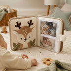 My First Family Photo Album Cloth Book in use — baby playing with cloth book