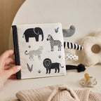 Oversized Sensory Tails Cloth Book size comparison with baby hands