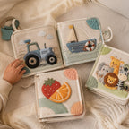 English-Proofed Early Learning Cloth Book in use — baby playing with cloth book