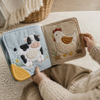 Farm Animal Sound Cloth Book in use — baby playing with cloth book