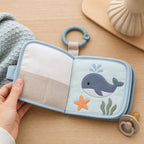 Washable Cloth Book with Care Label & Clip Ring size comparison with baby hands