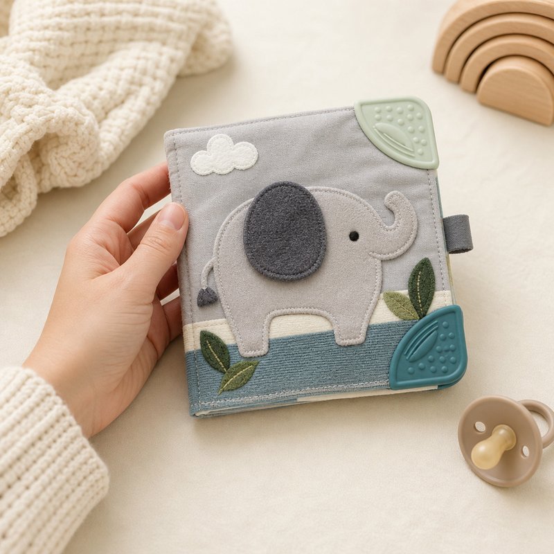 Original Animal Teether Cloth Book size comparison with baby hands