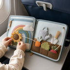Travel Busy Book in use — baby playing with cloth book