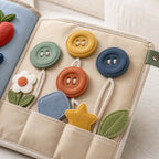 Reinforced Button Busy Book safety features — baby-safe construction